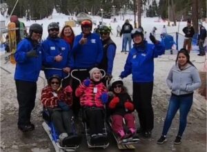 Mountain Shadows residents practicing adaptive skiing