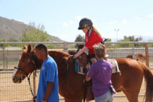 Michelle and King Horse riding program